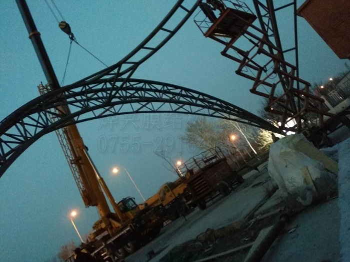 天津陽光海岸膜結(jié)構(gòu)入口雨棚安裝-深圳市燁興膜結(jié)構(gòu)工程有限公司 天津陽光海岸膜結(jié)構(gòu)入口雨棚安裝.jpg